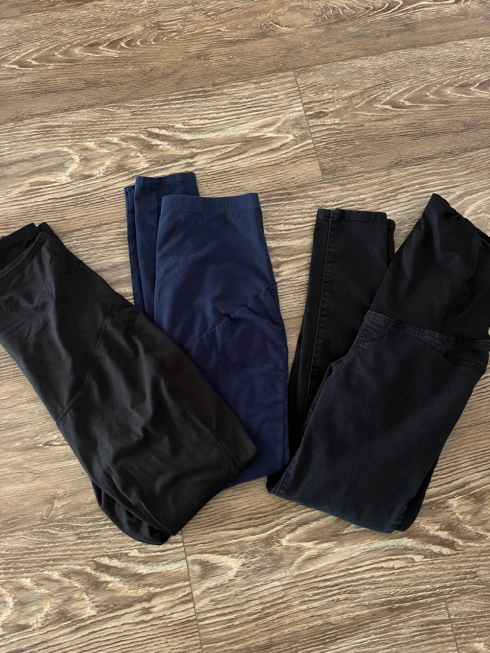 Set of three women’s maternity pants. Two leggings one jean.